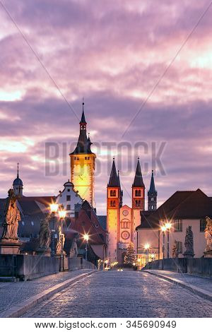 Old Main Bridge, Alte Mainbrucke With Statues Of Saints, Cathedral And City Hall In Old Town Of Wurz