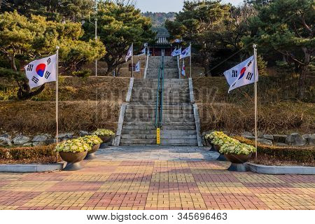 Cheonan, South Korea; January 3, 2020: Korean Flags Line Stairway Leading To Shrine For Korean Patri