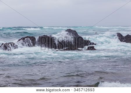 Beautiful Nature Sea Landscape Scene With Black Stone Of Jeju Island, South Korea