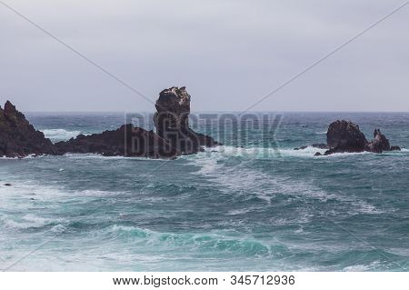 Beautiful Nature Sea Landscape Scene With Black Stone Of Jeju Island, South Korea