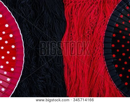 Fans For Spanish Flamenco Dance Lie On A Spanish Shawl. Copy Space