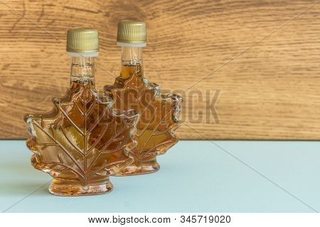 Maple Syrup In A Bottle Maple Leaf Shape. Suovenir From Canada.