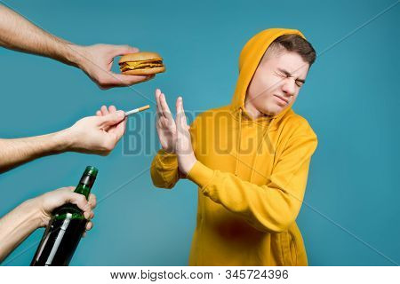 A Teenager Shows Disgust And Rejection When He Is Offered Bad Things Such As Smoking, Alcohol, Fast 