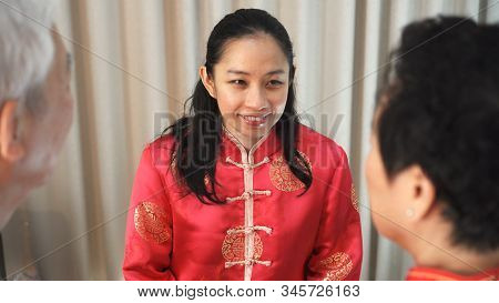 Chinese Family Happy Together In Chinese New Year Gathering Event