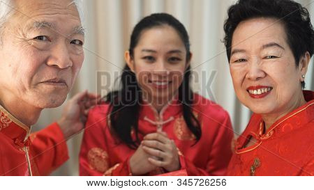 Chinese Family Happy Together In Chinese New Year Gathering Event