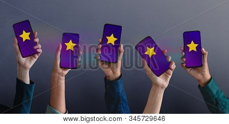Customer Experiences Concept. Group Of Modern People Giving Five Stars Rating, Positive Review Via S