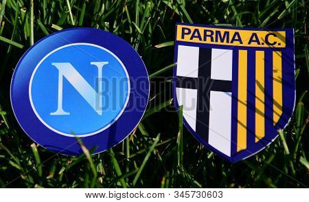 September 6, 2019, Turin, Italy. Emblems Of Italian Football Clubs Parma And Napoli Naples On The Gr