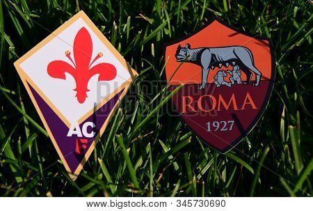 September 6, 2019, Turin, Italy. Emblems Of Italian Football Clubs Roma And Fiorentina Florence On T