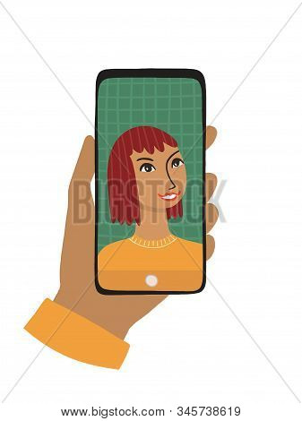 The Female Hand Holds A Smartphone. The Concept Of Photography, Chat, Video Call. Woman Smiles And T