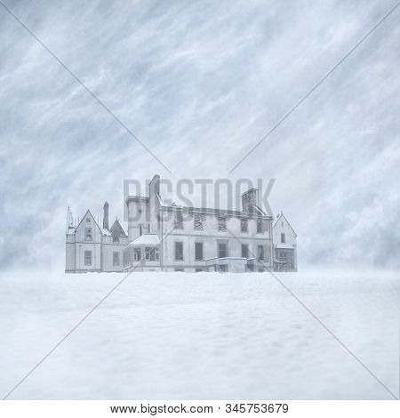 Derelict Old Mansion House Ruin In A Snow-covered Landscape Against A Blizzard Filled Sky Background