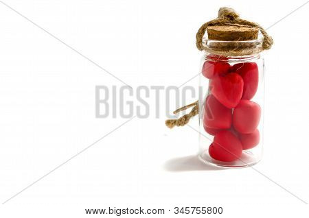Red Hearts In A Glass Bottle With A Brown Cork And A Rope Tow On A White Background Concept Valentin