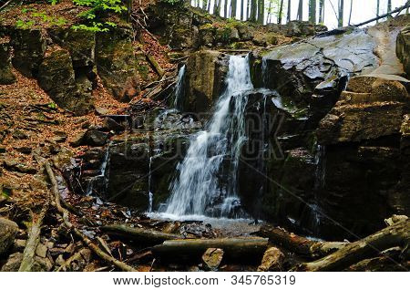 Skakalo Waterfall In The Carpathian Mountains Surrounded By Forest On A Spring Sunny Day