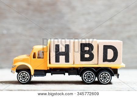 Truck Hold Letter Block In Word Hbd (abbreviation Of Happy Birthday) On Wood Background