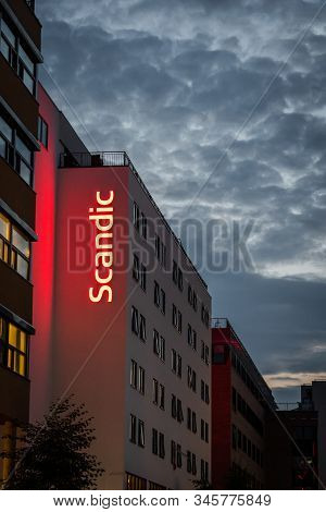 Editorial 08.31.2019 Oslo Norway Scandic Hotel Sign At The Facade Of The Hotel Building In The Sunse