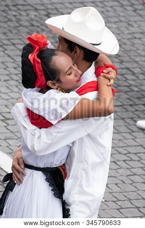 Xalapa, Veracruz, Mexico- November 24, 2019: Young Dancers Hugging, Dressed With Traditional Clothes