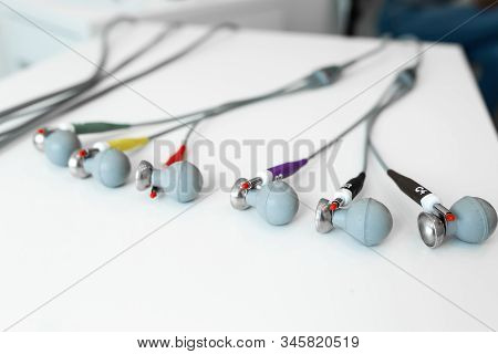 Sensors Electrodes With Suction Cups Lie On A Table In An Ecg Cabinet