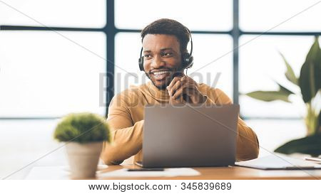 Hotline Support Service. Black Operator In Headset Working In Call Center, Panorama, Copyspace