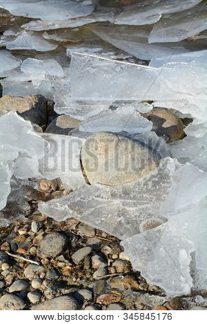Sheets Of Ice On Lake Shore Made From Waves And Repeated Melting And Refreezing During Winter