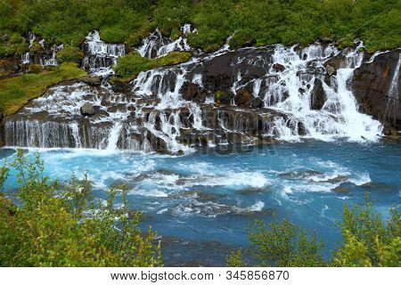 Beautiful Blue Waterfalls Of Barnafoss In Western Iceland