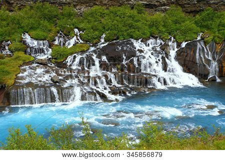 Beautiful Blue Waterfalls Of Barnafoss In Western Iceland