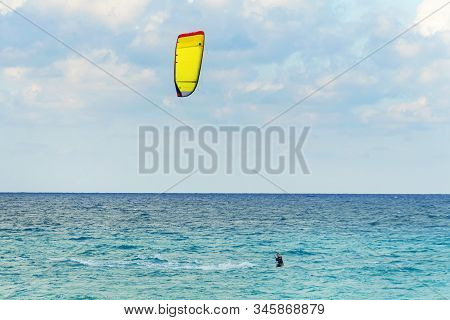 Man Is Kitesurfing In The Caribbean Sea In Varadero Cuba.