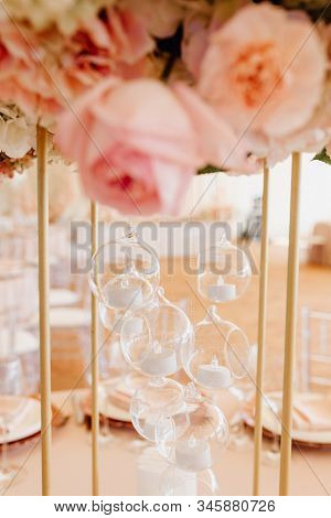 Beautiful Light Lamps In Glass Spheres And Flowers Roses On Metallic Skeleton Close-up Vertical Phot
