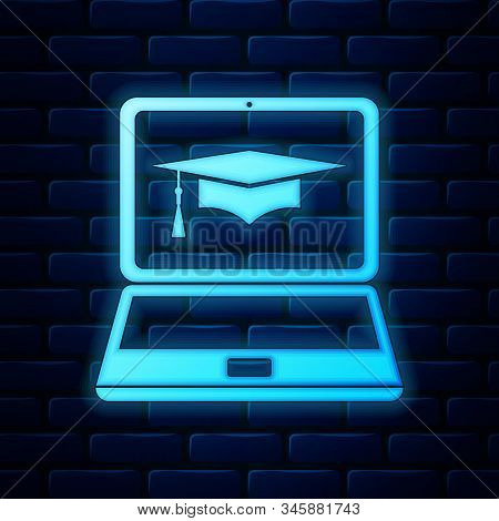 Glowing Neon Graduation Cap And Laptop Icon. Online Learning Or E-learning Concept Icon Isolated On 