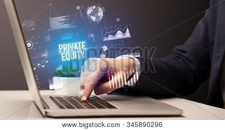Businessman working on laptop with PRIVATE EQUITY inscription, new business concept