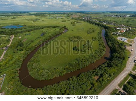 Aerial View Of River In Irbit City. Russia, Sverdlovsk Region, Summer, Sunny Day