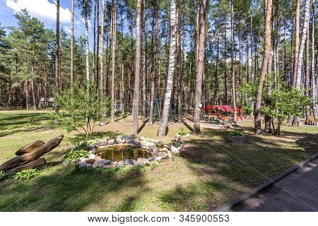 Wooden Camping Arbors  With All Conviniences In A Pine Forest