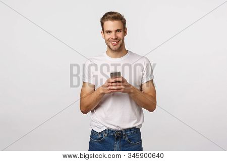 Telephone, Digital Modern Life, Technology Concept. Handsome Smiling Blond Caucasian Man With Bristl
