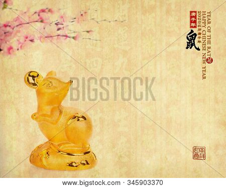 Tradition Chinese golden rat statue,2020 is year of the rat,rightside Chinese characters and wording mean:Chinese calendar for the year.word on rat and flower mean good bless