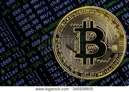 Blockchain Technologies And Mining Concept. Decentralized Cryptocurrency. Photo Of An Actual Symboli