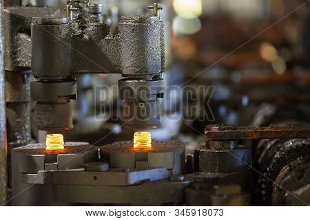 Glassworks. Glass Industry. Machine Conveyor For The Manufacture Of Glass Bottles.