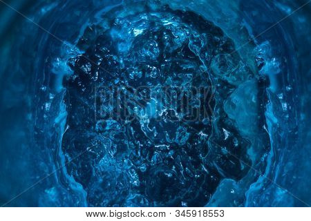 Textured Blue Substance Background. Foam Consistence Backdrop Closeup View Of Gel, Mousse Or Water. 