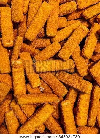 Lots Of Fish Sticks For Frying Food Background