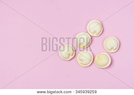 Uncooked Russian Pelmeni On Pink Background Homemade Pelmeni Ravioli Or Dumplings With Meat Top View
