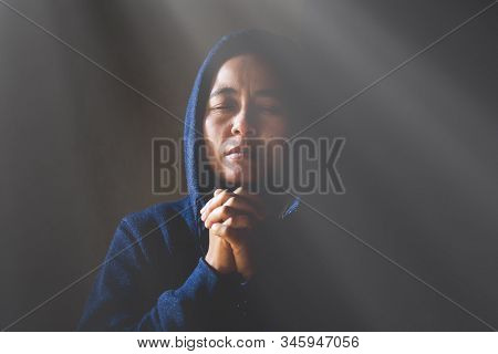 Woman Pray For God Blessing To Wishing Have A Better Life.