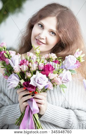 Beautiful Woman With A Bouquet. Ordinary Woman With Flowers