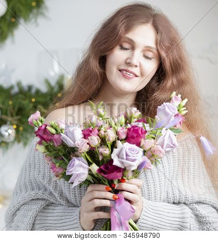 Beautiful Woman With A Bouquet. Ordinary Woman With Flowers