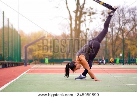 Girl Athlete Functional Training Sportground Mixed Race Young Adult Woman Workout Suspension System 
