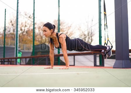 Girl Athlete Functional Training Sportground Mixed Race Young Adult Woman Workout Suspension System 