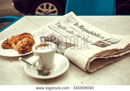 Palermo, Italy: Breakfast In Italian Street Cafe With Popular La Repubblica Newspaper, Cup Of Coffee