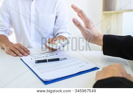 Businessman Refusing Receive Bribe Money In The Envelope Of Their Partner To Give Success The Deal C