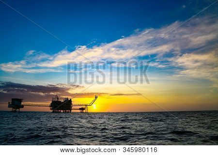 Offshore Construction Platform For Production Oil And Gas. Oil And Gas Industry And Hard Work. Produ