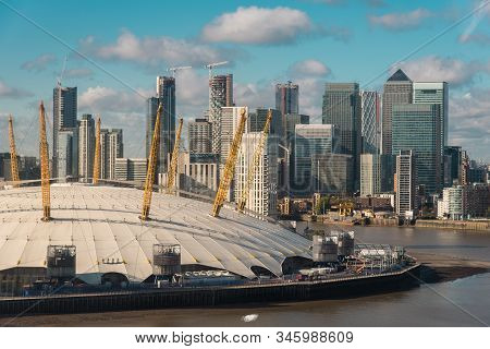 Elevated View Of The O2 Arena (the Millennium Dome) And The Canary Wharf Financial District In Londo