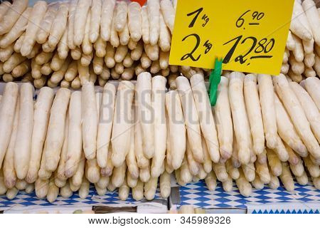 Raw white asparagus for sale at local market in Bavaria Germany - a popular vegetable during Spargel season (Spargelzeit or Spargelsaison)
