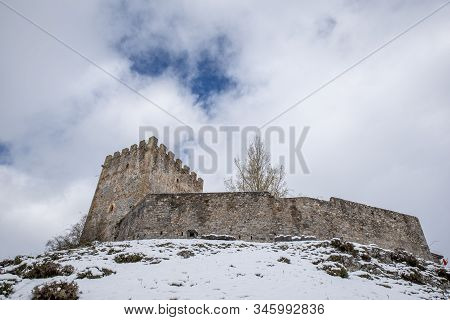 Medieval San Vicente Castle In A Winter Landscape With Snow