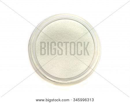 Top View Of Sugar In A Glass Bottle On White Background