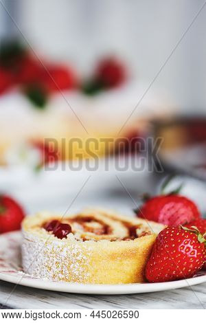 Homemade Strawberry Shortcake Cake Roll Or Roulade With A Berry Jam Filling And Powdered Sugar With 